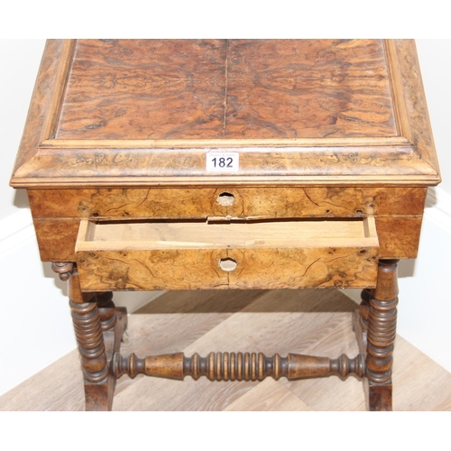 182 - An antique burr walnut sewing table on turned legs, approx 51 x 36 x 71cm