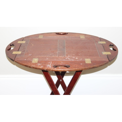 181 - A vintage mahogany butler's tray table on stand approx. 71cm W x 44cm D x 94cm H