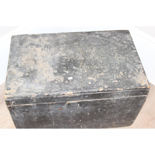 139 - A vintage black painted pine trunk or box with wrought iron handles, approx 70cm wide x 43cm deep x ... 