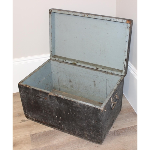 139 - A vintage black painted pine trunk or box with wrought iron handles, approx 70cm wide x 43cm deep x ... 