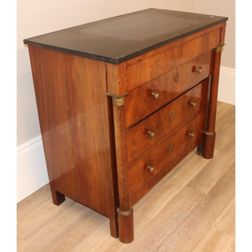 145 - A 19th century French Empire style mahogany 4 drawer chest of drawers with black marble top, gilt br... 