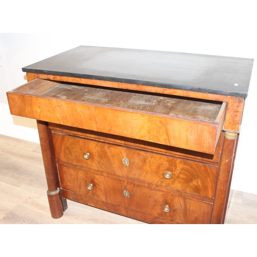 145 - A 19th century French Empire style mahogany 4 drawer chest of drawers with black marble top, gilt br... 