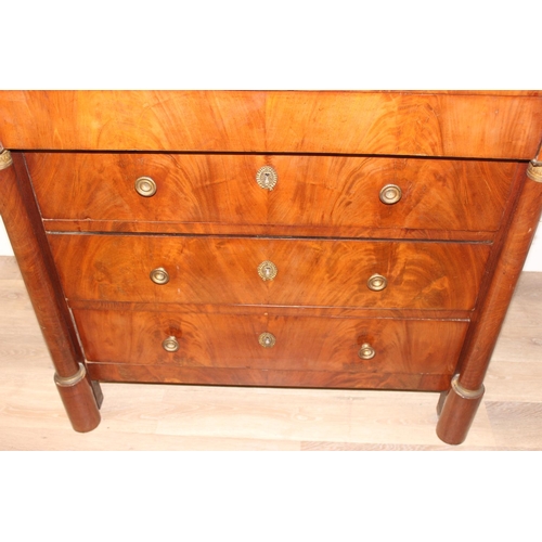 145 - A 19th century French Empire style mahogany 4 drawer chest of drawers with black marble top, gilt br... 