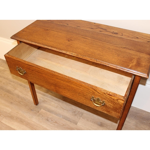 147 - A small vintage oak 2 drawer chest of drawers on square legs, approx 91cm wide x 45cm deep x 78cm ta... 