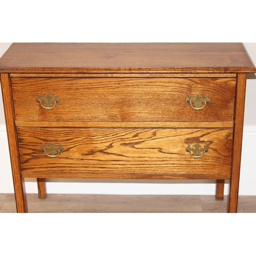 147 - A small vintage oak 2 drawer chest of drawers on square legs, approx 91cm wide x 45cm deep x 78cm ta... 