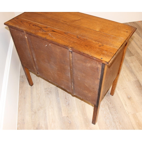 147 - A small vintage oak 2 drawer chest of drawers on square legs, approx 91cm wide x 45cm deep x 78cm ta... 