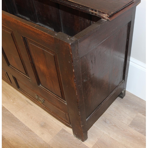 148 - An 18th century oak mule chest with panelled sides and 2 drawers to base, with later oak half foldin... 