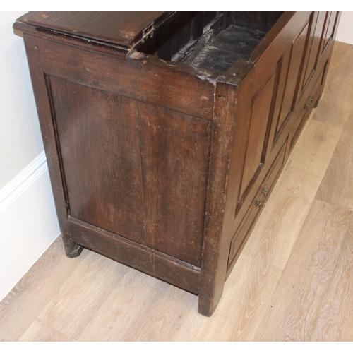 148 - An 18th century oak mule chest with panelled sides and 2 drawers to base, with later oak half foldin... 