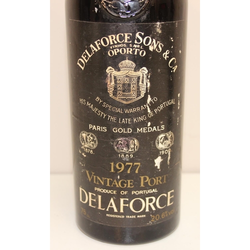 1531 - 75cl 1977 bottle of Delaforce port and a 34cl Courvoisier cognac brandy (2)