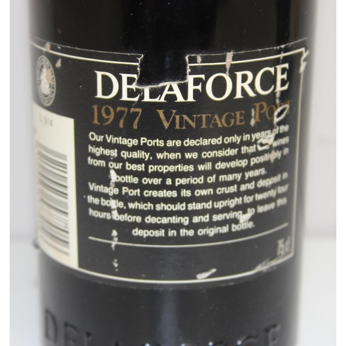 1531 - 75cl 1977 bottle of Delaforce port and a 34cl Courvoisier cognac brandy (2)