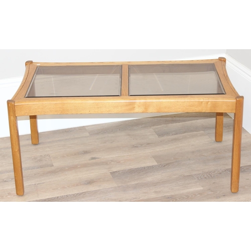 159 - Rectangular Ercol coffee table with dual glass panel top, approx 106cm W x 59cm D x 49cm H