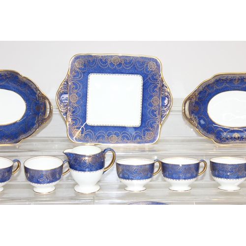 1717 - Wedgwood part tea set in blue and white with gilt decoration to incl cups, saucers, side plates etc