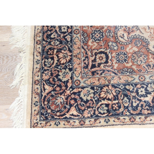 201 - A large vintage Super Keshan rug of blue red and cream ground, approx 200 x 140cm