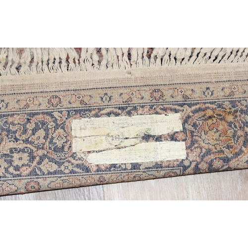 201 - A large vintage Super Keshan rug of blue red and cream ground, approx 200 x 140cm