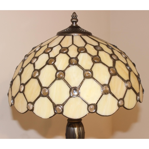 250 - Tiffany style standard lamp with Art Nouveau inspired base in a bronzed effect finish, approx 168cm