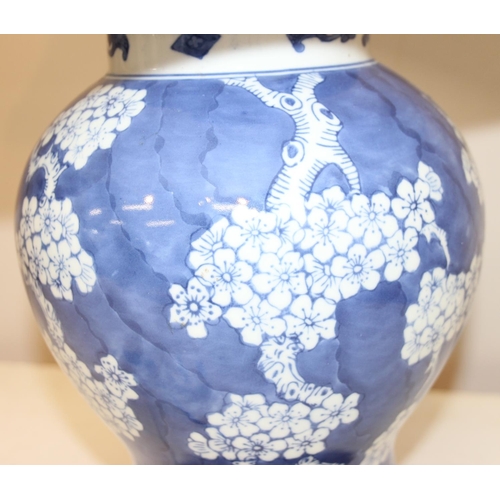 253 - Vintage blue and white Chinese style ginger jar shaped lamp with cherry blossom design decoration on... 