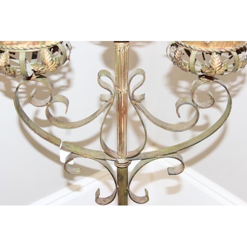 300 - Wrought iron 3 branch freestanding candleholder with leaf design, approx 130cm