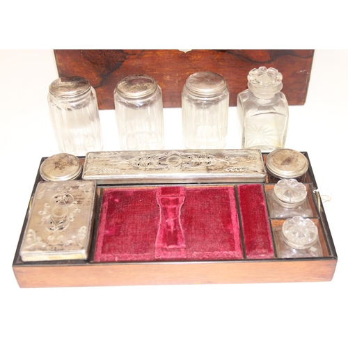 303 - Antique ladies travelling vanity case with silver plate and cut glass jars, red velvet interior appr... 