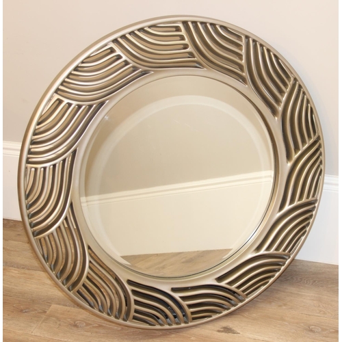 417 - Large round mirror with wave style design frame, approx 97cm diam