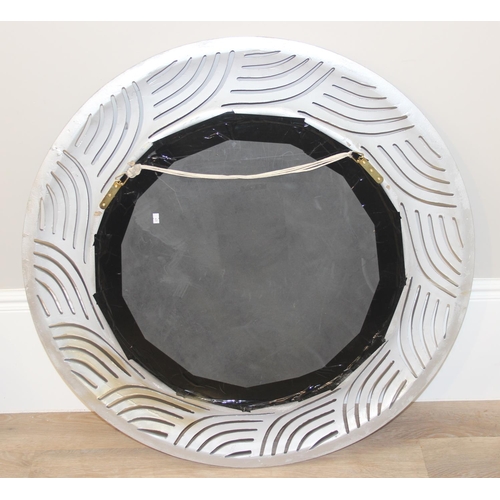 417 - Large round mirror with wave style design frame, approx 97cm diam