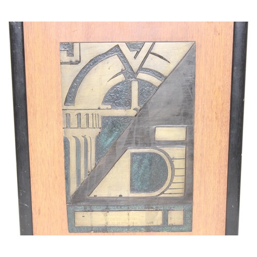 448 - An unusual framed abstract bronze plaque, the plaque titled 