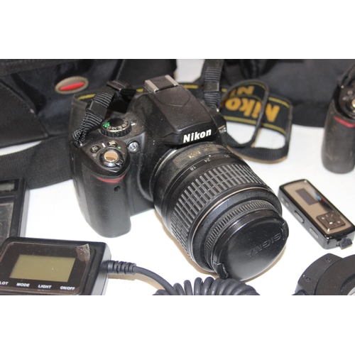 705 - Qty of assorted Nikon related camera odds to in lenses etc and 2 digital cameras, D40 & D3100