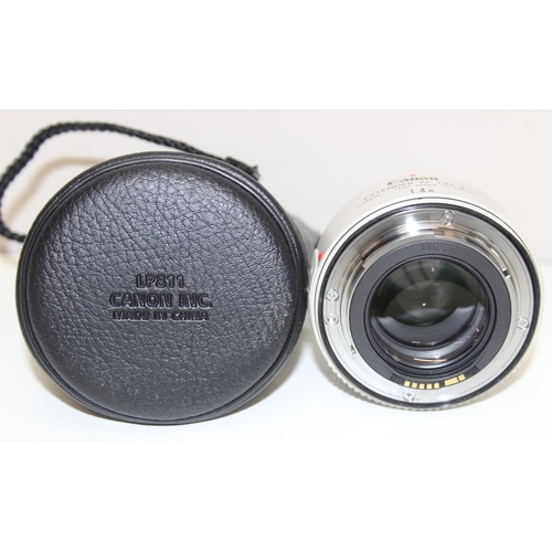 708 - Canon Extender EF 1.4x II lens in case