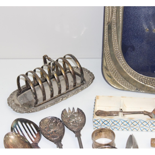 1029 - Qty silver-plated and other metalware items to incl an Art Nouveau style photo frame, flatware, toas... 