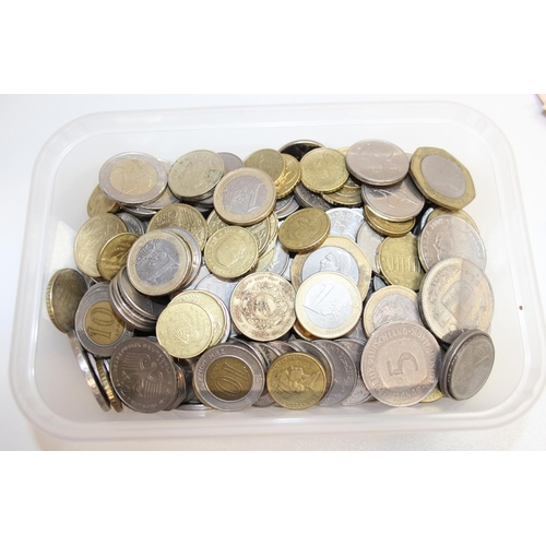 1203 - A large qty of assorted mixed world and British coins and banknotes, approx 2.4kg gross