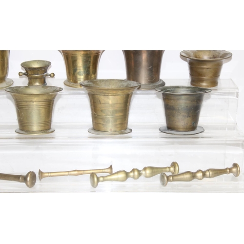 1558 - 8 assorted antique and later brass or bell metal mortars and 4 pestles, the largest approx 11cm tall