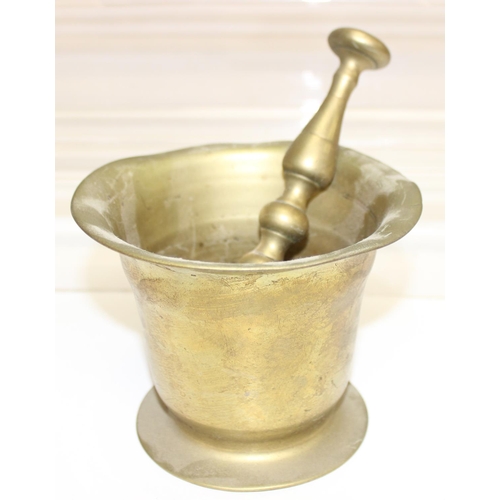 1558 - 8 assorted antique and later brass or bell metal mortars and 4 pestles, the largest approx 11cm tall