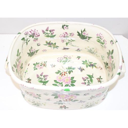 1737 - 2 antique style floral decorated ironstone pottery footbaths, marked to base, the largest approx 51c... 