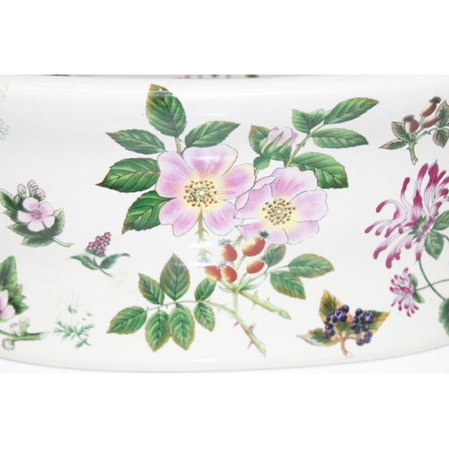 1737 - 2 antique style floral decorated ironstone pottery footbaths, marked to base, the largest approx 51c... 