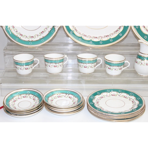 1742 - A Victorian floral, green and gilt pattered tea set, seemingly unmarked