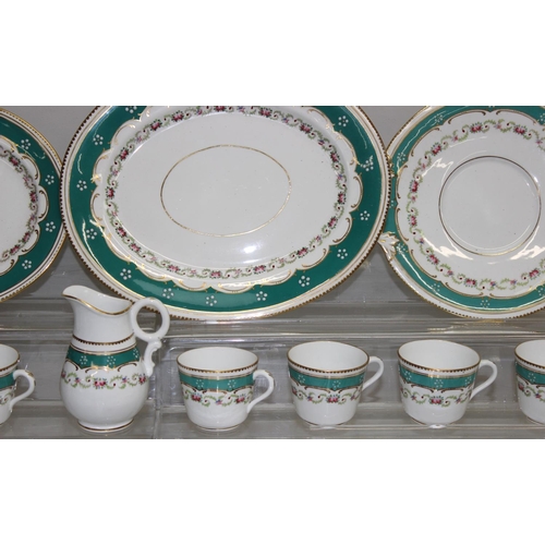 1742 - A Victorian floral, green and gilt pattered tea set, seemingly unmarked