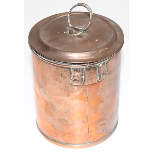 1749 - 3 antique copper cannisters with tin lined interiors, a graduated set, the largest approx 15cm tall