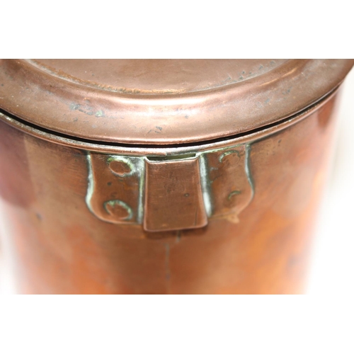 1749 - 3 antique copper cannisters with tin lined interiors, a graduated set, the largest approx 15cm tall