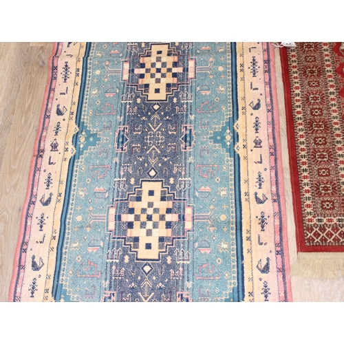 205 - 2 vintage rugs, one colourful geometric style design and a red ground Middle Eastern style rug, larg... 