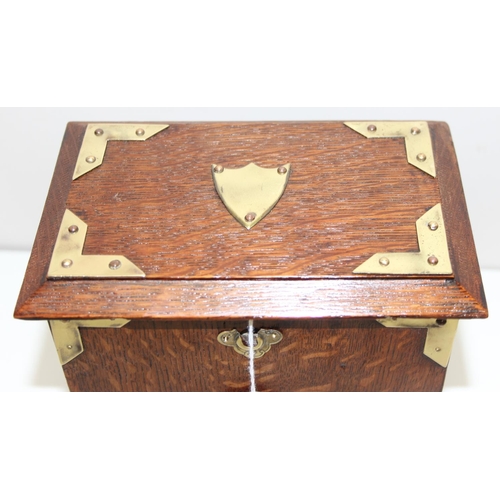 311 - An early 20th century oak stationary box or letter rack with brass corners, approx 20cm wide x 13cm ... 