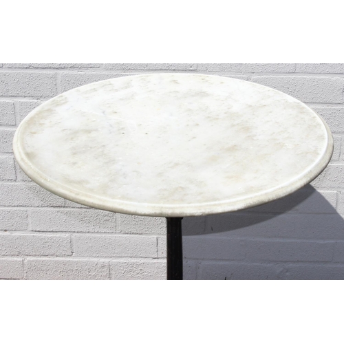 359 - Circular marble topped table with black painted cast iron tripod base, approx 72cm H x 56cm W