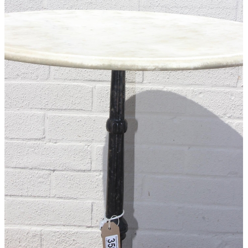 359 - Circular marble topped table with black painted cast iron tripod base, approx 72cm H x 56cm W