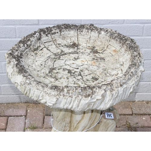 366 - Large concrete birdbath with tree stump and woodland animal design, approx 70cm H