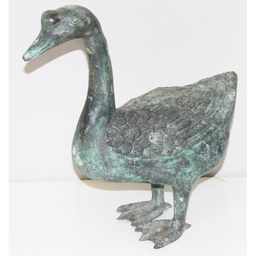 373 - An unusual vintage metal swan garden ornament with Verdigris finish, approx 31cm tall