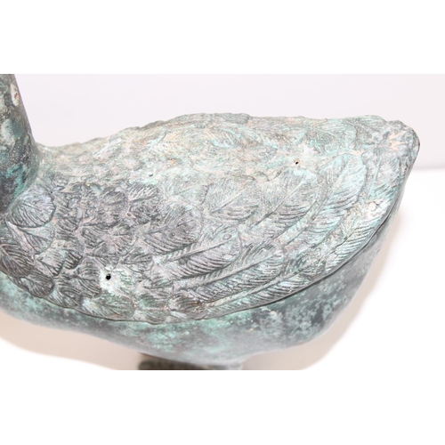 373 - An unusual vintage metal swan garden ornament with Verdigris finish, approx 31cm tall