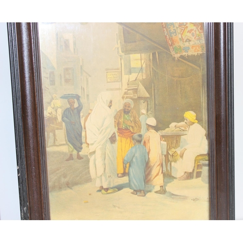 465 - A vintage pair of coloured prints depicting Middle Eastern street market scenes, after Otto Pilny (C... 