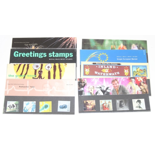 521 - Stamps - a large qty of assorted modern Presentation Pack stamps, each pack with the same loose stam... 