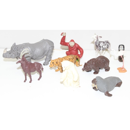 608 - A huge qty of assorted plastic toy zoo and wild animals, many Britains