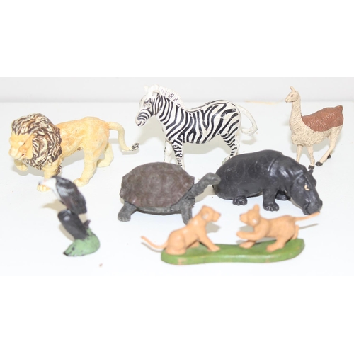 608 - A huge qty of assorted plastic toy zoo and wild animals, many Britains