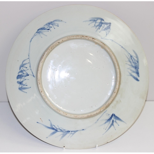 1570 - Antique Chinese Prunus Blossom blue and white charger, approx 34.5cm diam