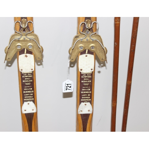 721 - Pair of vintage Norwegian wooden cross country skis with Rottefella bindings, and a pair of wooden s... 